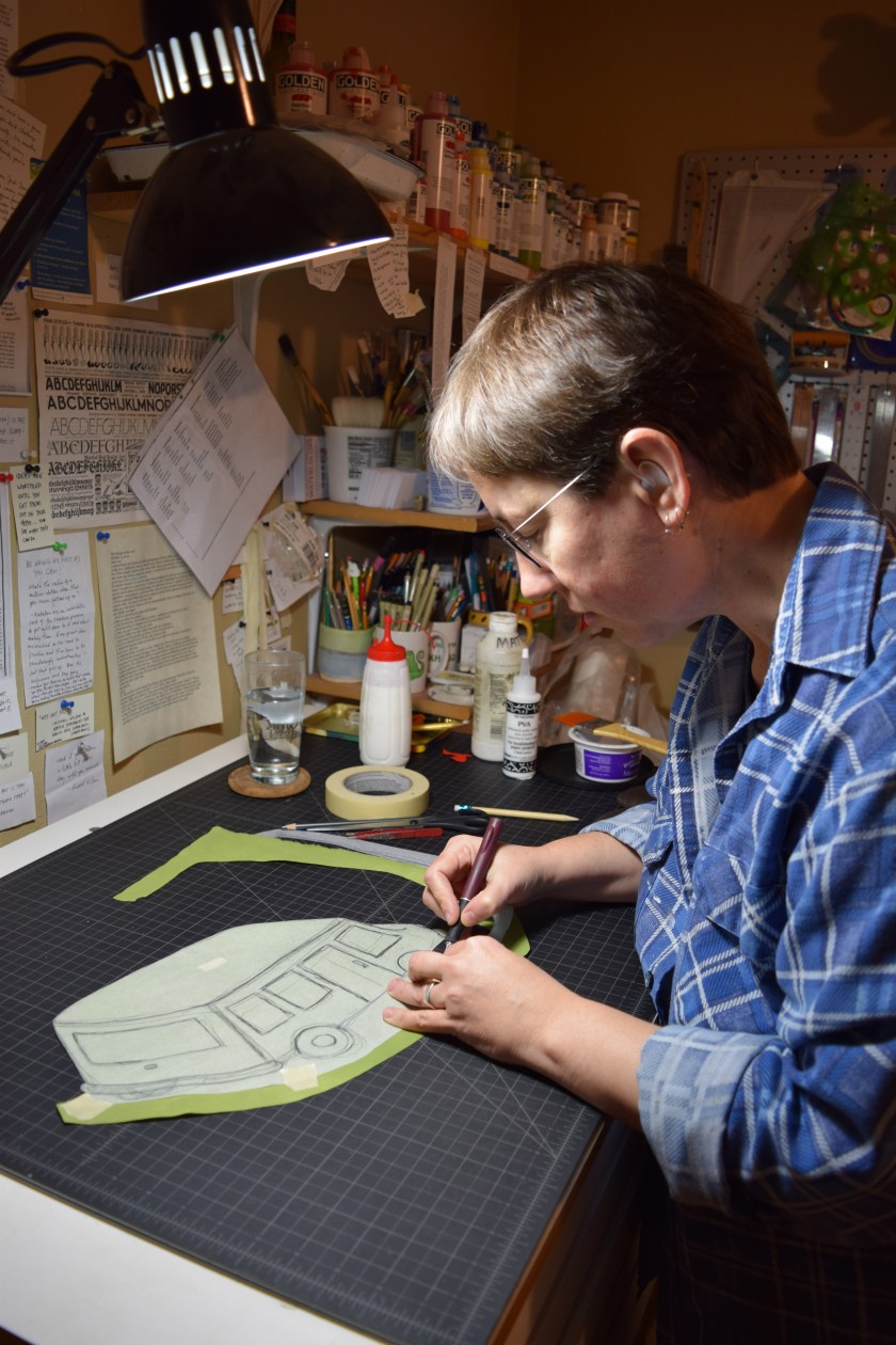 Cutting dyed paper into a shape