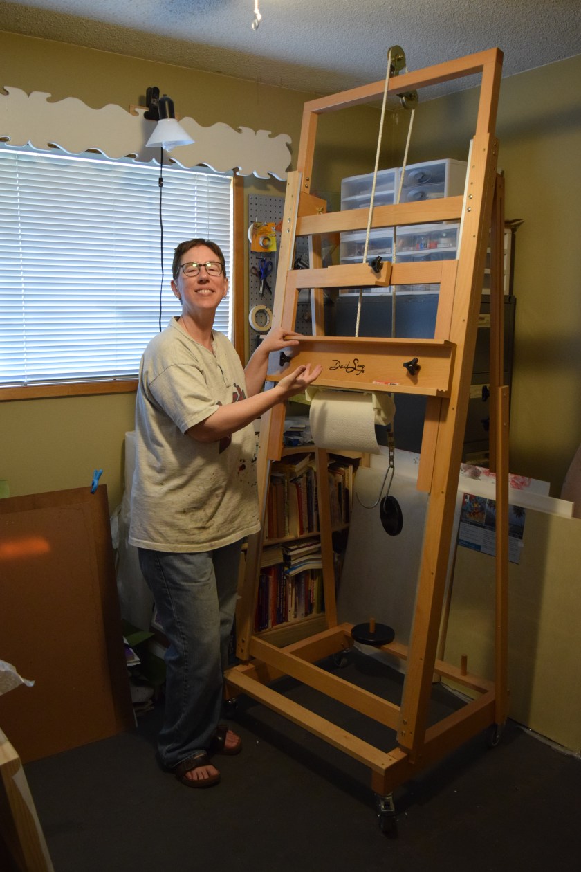 Sue Clancy posing with her new Sorg easel a'la a magazine model