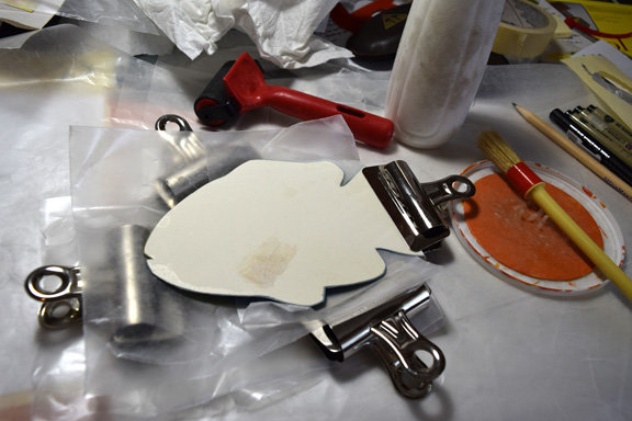 Living dangerously and binding a pop-up book titled "A Fish Story" by Sue Clancy