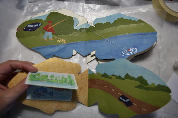 Two page spreads from an in-progress pop-up book "A Fish Story" by Sue Clancy